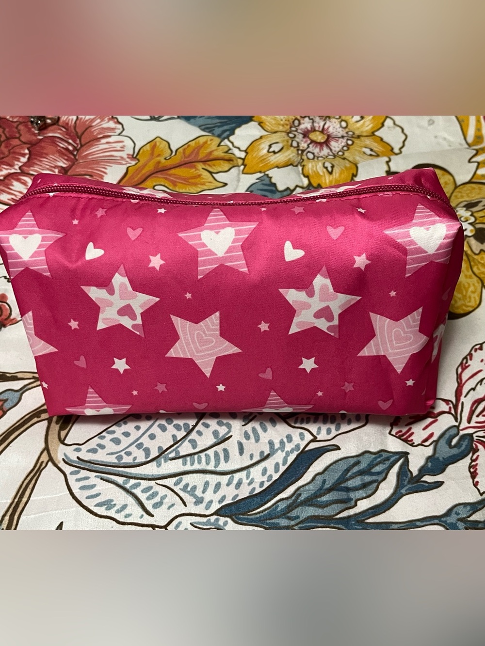 Pink W/White Stars print makeup pouch.